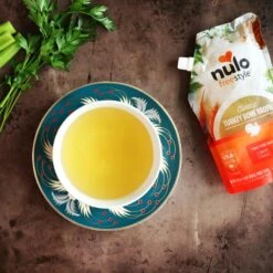 Nulo FreeStyle Grain-Free Classic Turkey Bone Broth Dog & Cat Topper, 20-oz Pouch 12 Nulo FreeStyle Grain-Free Classic Turkey Bone Broth Dog & Cat Topper, 20-oz Pouch -Snuggle Paws 297531 PT2. AC SS1800 V1665526201